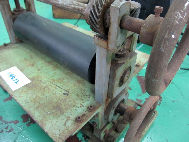 ローラー式加圧装置